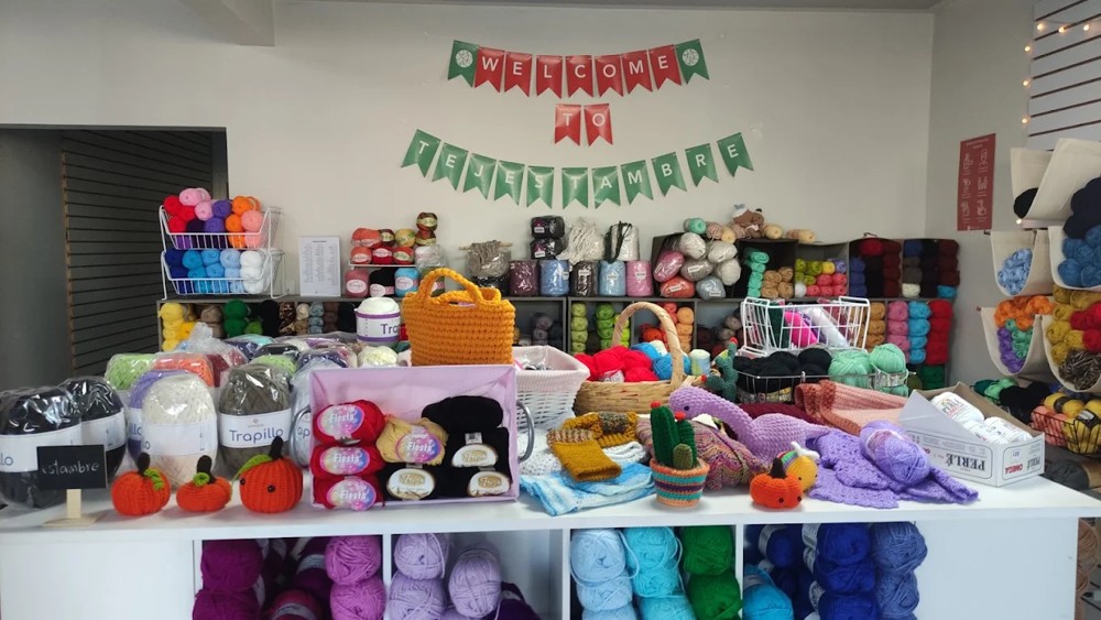 Tejestambre shop filled with colorful yarn and crochet projects